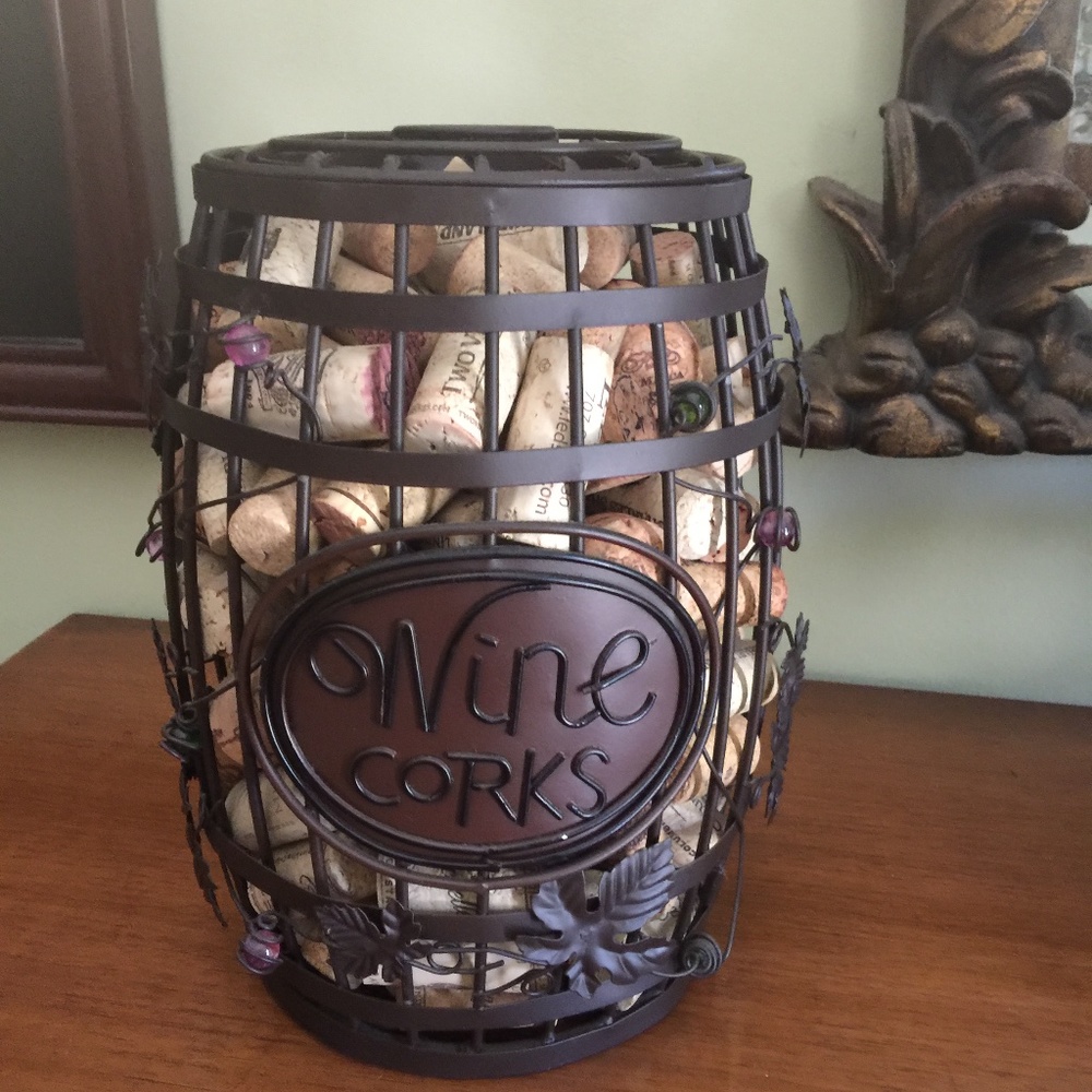 Wrought iron wine corks and holder.